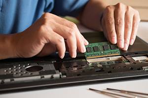 Person working on IT hardware